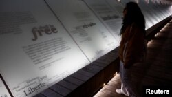 FILE— People visit the Memorial to the Abolition of Slavery in Nantes, France, March 23, 2024.