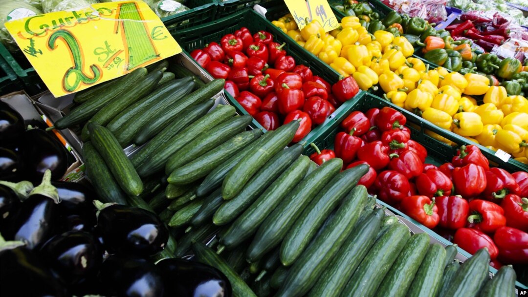 Cucumbers, two for 1 Euro ( $1.40) , are displayed for sale between other vegetables outside a supermarket in Berlin, Germany, May 30, 2011. 