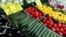 Cucumbers, two for 1 Euro ( $1.40) , are displayed for sale between other vegetables outside a supermarket in Berlin, Germany, May 30, 2011. 