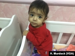 This baby, pictured Dec. 24, 2017, was found with six broken ribs from the battle for Mosul.