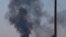 5月29日被击落的政府军直升机冒出浓烟