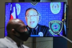 Houston Police Chief Art Acevedo, right, gives his opening statement as George Floyd's brother Philonise Floyd listens during a House Judiciary Committee hearing to discuss police brutality and racial profiling, in Washington, June 10, 2020.