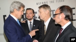 FILE- U.S. Secretary of State John Kerry (from left) Leonardo Dicaprio, Piers Sellers and Fisher Stevens attend the premiere of National Geographic Channel's "Before The Flood," at the United Nations headquarters, Oct. 20, 2016. Sellers, a climate scientist and former astronaut died Dec. 23. He was 61.