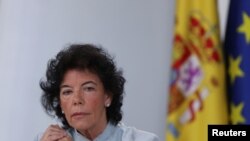 FILE - Spain's Isabel Celaa gestures during a news conference after a cabinet meeting at the Moncloa Palace in Madrid, Spain, June 8, 2018.