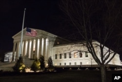 A U.S. flag flies at half-staff in front of the U.S. Supreme Court in Washington, Feb. 13, 2016, after is was announced that Supreme Court Justice Antonin Scalia, 79, had died.