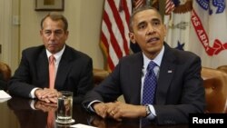 US President Barack Obama speaks at a White House meeting on the economy with congressional leaders November 16, 2012. To the president's left is House Speaker John Boehner.