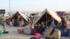 Afghan refugees rest in tents at a makeshift shelter camp in Chaman, a Pakistani town on the border with Afghanistan, on Aug. 31, 2021.