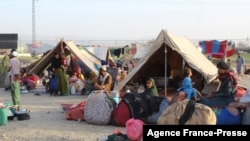 Afghan refugees rest in tents at a makeshift shelter camp in Chaman, a Pakistani town on the border with Afghanistan, on Aug. 31, 2021.