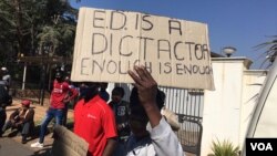 Protesters in South Africa outside the Zimbabwe Embassy.