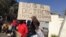 Protesters in South Africa outside the Zimbabwe Embassy.