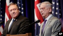 U.S. Secretary of Defense Jim Mattis, right, speaks next to U.S. Secretary of State Mike Pompeo at the 2018 Australia-U.S. Ministerial Consultations in Stanford, Calif., July 24, 2018. The two secretaries travel to India for "2 plus 2" dialogue Thursday.
