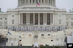 Preparations take place for President-elect Joe Biden's inauguration on the West Front of the U.S. Capitol in Washington, Jan. 8, 2021, after supporters of President Donald Trump stormed the building.