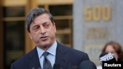U.S. Deputy Attorney Robert Khuzami speaks to the media outside the the Daniel Patrick Moynihan United States Court House after U.S. President Donald Trump's former lawyer, Michael Cohen, plead guilty to eight criminal counts in lower Manhattan, New York City, Aug. 21, 2018.