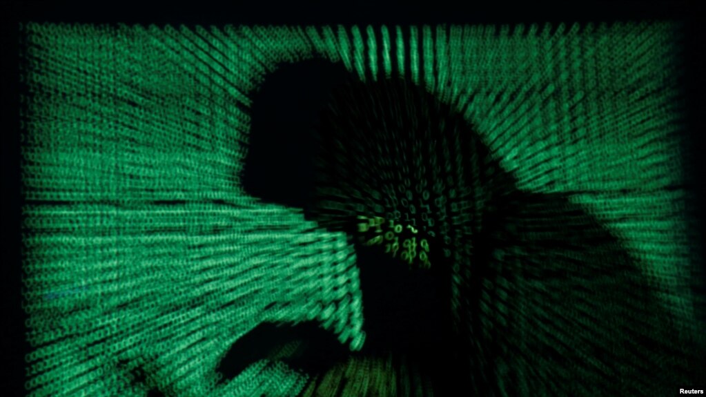 黑客发动恶意软件网络袭击模拟图。(photo:VOA)