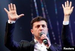 FILE - Volodymyr Zelenskiy, a Ukrainian comedian and candidate in the upcoming presidential election, is pictured at a concert hall in Brovary, Ukraine, March 29, 2019.