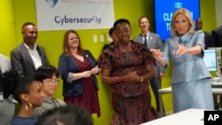 FILE—First lady Jill Biden, from right, and Kenya's first lady Rachel Ruto speak to students at a cybersecurity class at the Advanced Technical Center, May 23, 2024, in Washington.