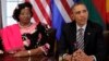 U.S. President Barack Obama (R) talks to the media next to President Joyce Banda of Malawi after his meeting with African leaders at the White House in Washington March 28, 2013