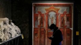 Archeological findings are displayed at the museum Antiquarium in Pompeii, southern Italy, Monday, Jan. 25, 2021. (AP Photo/Gregorio Borgia)