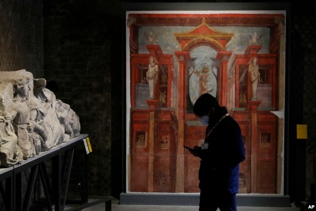 Archeological findings are displayed at the museum Antiquarium in Pompeii, southern Italy, Monday, Jan. 25, 2021. (AP Photo/Gregorio Borgia)