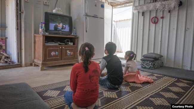 The new solar power plant at the Azraq refugee camp in Jordan is providing electricity in shelters like these for Syrian refugees. (UNHCR/Benoit Almeras Martino)