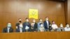 香港各界回應中國人大決定立法會議員延任一年 泛民議員去留未定
