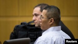 Johnathan Doody listens as he is found guilty of the 1991 execution-style murders of nine people, including six monks, at a Buddhist temple near Phoenix, January 23, 2014
