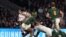 FILE: England's Marcus Smith is tackled by South Africa's Makazole Mapimpi during the international rugby match between England and South Africa at Twickenham stadium in London. taken Sat. Nov. 26, 2022.