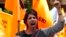 FILE - A protester shouts slogans against Turkey's Prime Minister Recep Tayyip Erdogan and his government's policy on Syria, during a demonstration in Ankara, May 18, 2013.
