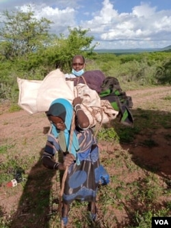 Families have been displaced from Wachile, Southern Oromia region of Ethiopia, May 5, 2020. The country is trying to avoid a food crisis caused by a huge invasion of locusts.