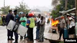 Des habitants de Beni lors d'une manifestation pour dénoncer les tueries répétées dans cette région du Nord-Kivu, dans lest de la RDC, le 22 ocotobre 2014. 