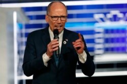 Chair of the Democratic National Committee, Tom Perez, speaks before a Democratic presidential primary debate, Nov. 20, 2019, in Atlanta.