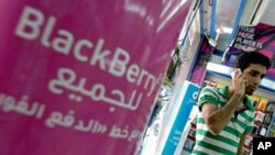 A sign advertising the BlackBerry mobile phone for all is seen at a shopping mall in Dubai (File)