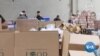 Kegiatan pendistribusian makanan di Los Angeles Regional Food Bank. (Foto: videograb).