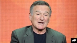 FILE - In this July 29, 2013 file photo, actor Robin Williams participates in the "The Crazy Ones" panel at the 2013 CBS Summer TCA Press Tour at the Beverly Hilton Hotel in Beverly Hills, California. 
