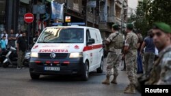 An ambulance arrives to American University of Beirut Medical Center as more than 1,000 people were wounded when the pagers they use to communicate exploded across Lebanon, according to a security source, in Beirut, Sept. 17, 2024.