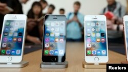 The new iPhone SE is seen on display during an event at the Apple headquarters in Cupertino, California, March 21, 2016. 