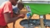 Oxfam Field Testing Hand Washing Stands to Cut Risk of Disease