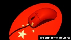 A computer mouse with a Chinese flag in this photo illustation. Oct. 1, 2013 (REUTERS/Tim Wimborne/File Photo)