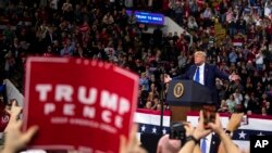 FILE - President Donald Trump speaks during a campaign rally at UW-Milwaukee Panther Arena in Milwaukee, Jan. 14, 2020.