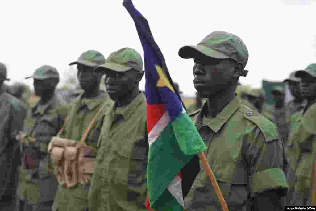 Rebel soldiers stand at attention at their base on the outskirts of Juba, South Suday, April 7, 2016. The rebels are returning to secure the city ahead of the arrival of their leader, Riek Machar, scheduled for April 18.