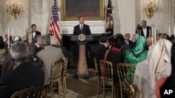 Президент США Барак Обама на ифтаре – ужине, организованном в Белом доме по случаю исламского священного месяца Рамадан.
