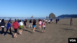 Cannon Beach's landmark Haystack Rock provided a backdrop for the tsunami prep fun run. VOA / T. Banse