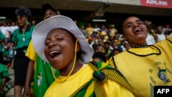 FILE - African National Congress (ANC) supporters sing and chant during the 112th ANC Anniversary rally in Mbombela on January 13, 2024. 