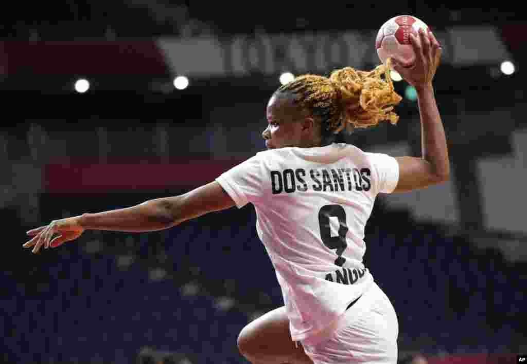 Angola&#39;s Natalia Santos in action during the women&#39;s preliminary round group A handball match between Montenegro and Angola at the 2020 Summer Olympics, Sunday, July 25, 2021, in Tokyo, Japan. (AP Photo/Sergei Grits)