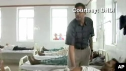 An Argentina soccer fan cheers outside the Maracana Stadium before the group F World Cup soccer match between Argentina and Bosnia, in Rio de Janeiro, Brazil, June 15, 2014.
