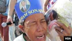 Supporters gathered outside the court on Friday, calling for his release.