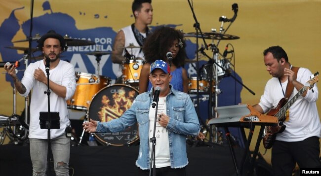 Spanish singer Alejandro Sanz performs in the Venezuela Aid Live concert on the Colombian side of the Tienditas International Bridge near Cucuta, Colombia, on the border with Venezuela, Feb. 22, 2019.