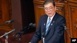 Japan's Prime Minister Shigeru Ishiba delivers a policy speech marking the start of this year's parliamentary session in Tokyo, Jan. 24, 2025.