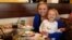 Cailyn Pierson and her mother visit Olive Garden in Naperville, Ill., on Take Our Daughters and Sons to Work Day in this photo distrubuted by the Olive Garden, April 25, 2013.