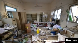 FILE - Damage is seen inside a hospital operated by Medecins Sans Frontieres after it was hit by a Saudi-led coalition airstrike in the Abs district of Hajja province, Yemen, Aug. 16, 2016.
